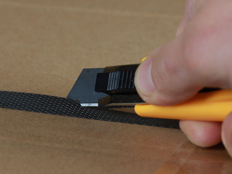 Umreifungsband (PP/PET) — Sicherheitsmesser Basic auto im Einsatz